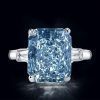 Three Stone Radiant Cut Blue Topaz Engagement Ring in Sterling Silver