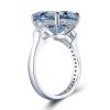 Three Stone Radiant Cut Blue Topaz Engagement Ring in Sterling Silver