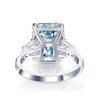 Three Stone Radiant Cut Blue Topaz Engagement Ring in Sterling Silver
