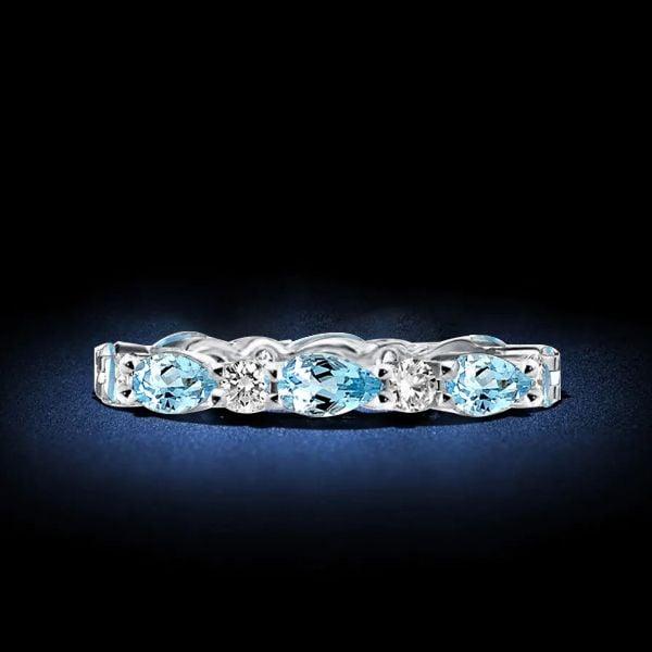 Pear Shaped Aquamarine Eternity Band in Sterling Silver with Rhodium Plating