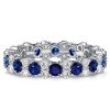 2.24 CT. TW. Round Cut Blue Sapphire Eternity Ring for Women in Rhodium Plated Sterling Silver