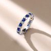 2.24 CT. TW. Round Cut Blue Sapphire Eternity Ring for Women in Rhodium Plated Sterling Silver