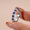 2.24 CT. TW. Round Cut Blue Sapphire Eternity Ring for Women in Rhodium Plated Sterling Silver