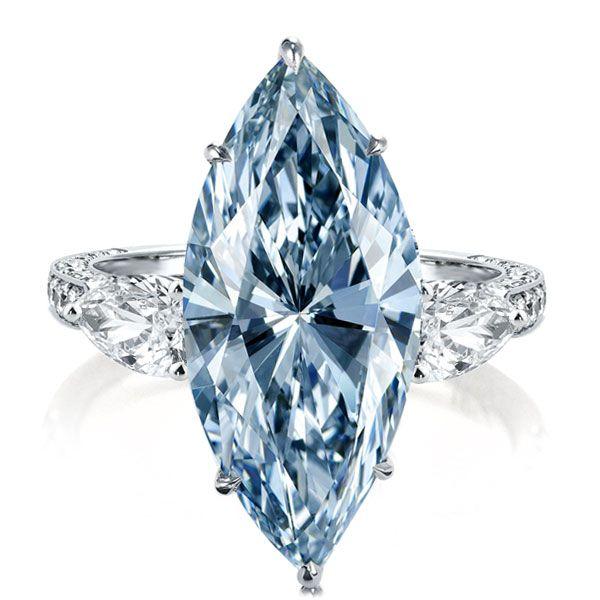 Three Stone Marquise Cut Blue Simulated Sapphire Engagement Ring in Sterling Silver