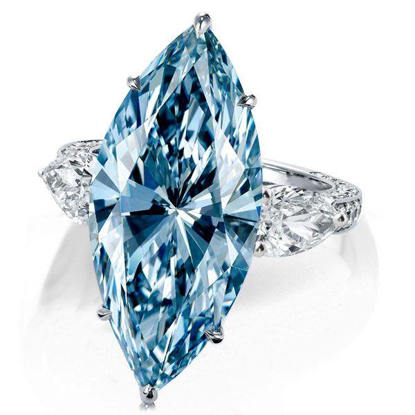 Three Stone Marquise Cut Blue Simulated Sapphire Engagement Ring in Sterling Silver