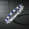 Sterling Silver Blue Oval & Baguette Cut CZ Tennis Bracelet for Women