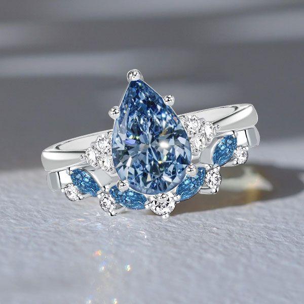 Pear-Shaped Blue Topaz Bridal Ring Set in Sterling Silver