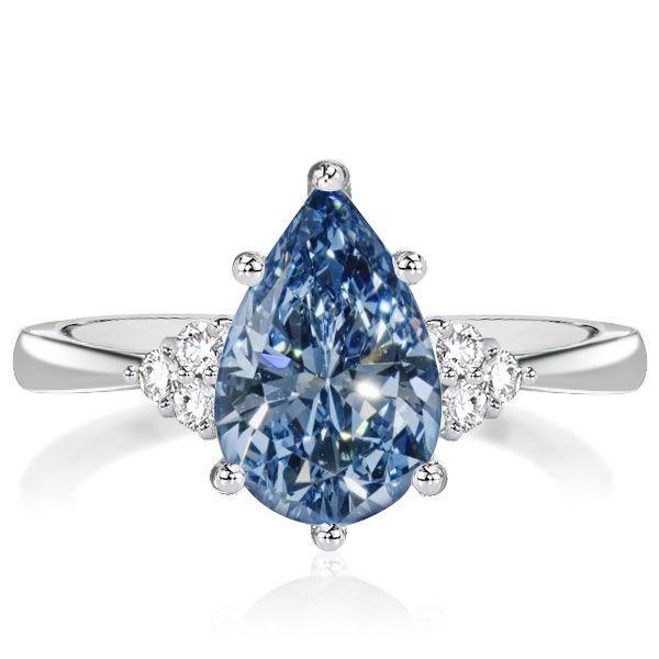 Pear-Shaped Blue Topaz Bridal Ring Set in Sterling Silver