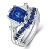 Three Stone Emerald Cut Sapphire and Diamond Bridal Set in Rhodium Plated Sterling Silver
