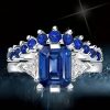 Three Stone Emerald Cut Sapphire and Diamond Bridal Set in Rhodium Plated Sterling Silver