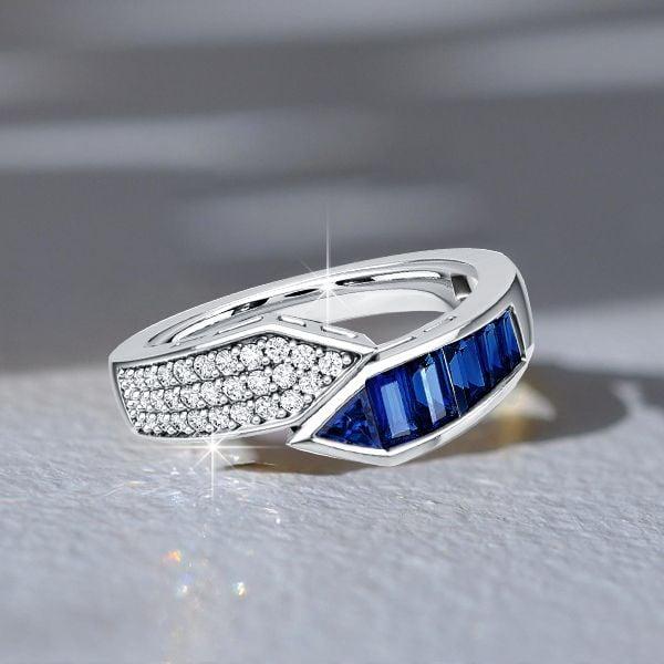 Sterling Silver Bypass Design Emerald Cut Blue Sapphire Band Ring (1.08 CT. TW.)