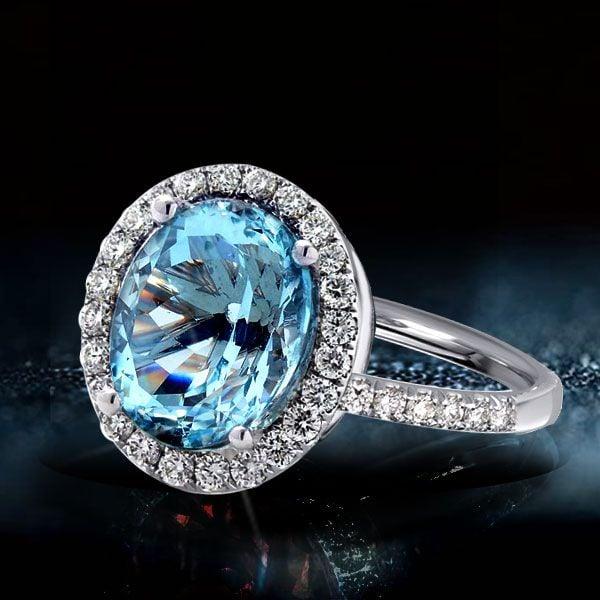 Oval Cut Aquamarine Engagement Ring in Rhodium Plated 925 Sterling Silver