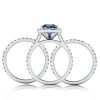 Pear Cut Blue Topaz Engagement Ring Set in Rhodium Plated Sterling Silver