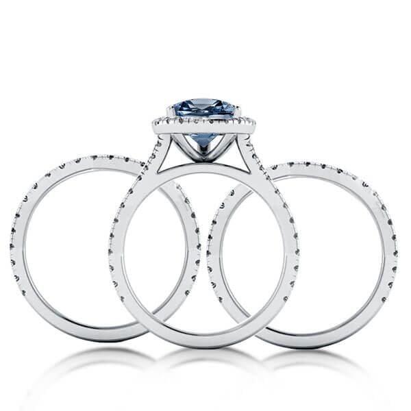 Pear Cut Blue Topaz Engagement Ring Set in Rhodium Plated Sterling Silver