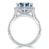 Pear Cut Blue Topaz Engagement Ring Set in Rhodium Plated Sterling Silver