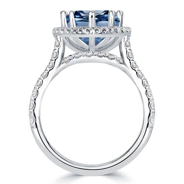 Pear Cut Blue Topaz Engagement Ring Set in Rhodium Plated Sterling Silver