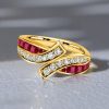 1.12 CT. TW. Golden Bypass Ruby Eternity Wedding Band in 18K Gold Plated Sterling Silver