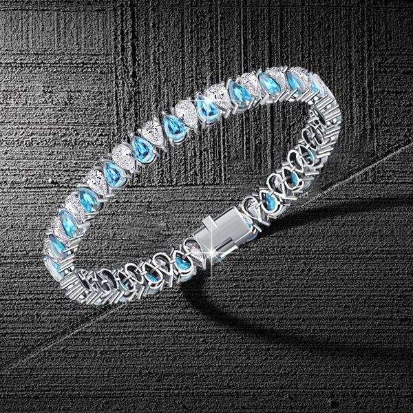 Pear Cut Aquamarine & White CZ Tennis Bracelet in Sterling Silver