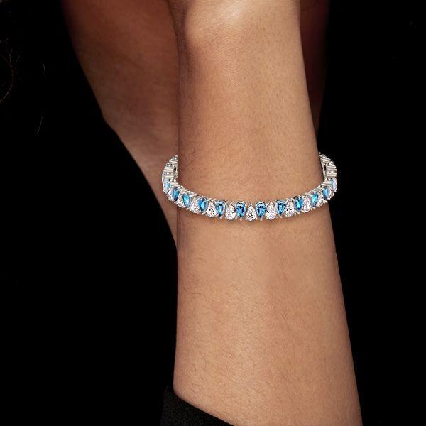 Pear Cut Aquamarine & White CZ Tennis Bracelet in Sterling Silver