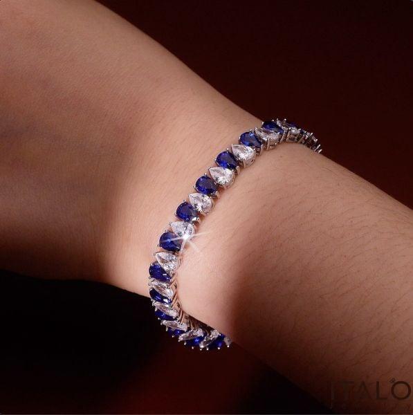 White and Blue Sapphire Pear Cut Tennis Bracelet in Sterling Silver