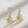 Pear Cut Yellow Topaz Drop Earrings in Rhodium Plated 925 Sterling Silver