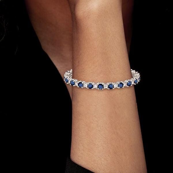 Women's Round Cut White and Blue Sapphire Tennis Bracelet in Sterling Silver