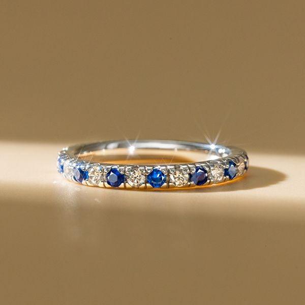 Sterling Silver Round Cut Wedding Band 1.50 CT. TW. Blue and White Stones