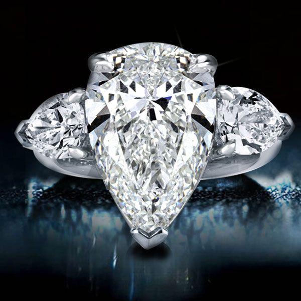 Pear Cut Three Stone Ring - Sterling Silver - Simulated Diamond