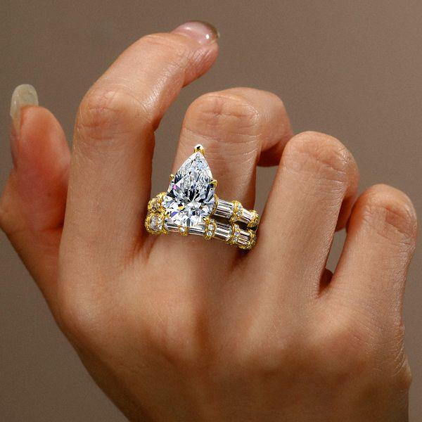 Pear Cut Wedding Ring Set: 18K Gold Plated Sterling Silver, 9.00 CT. TW.
