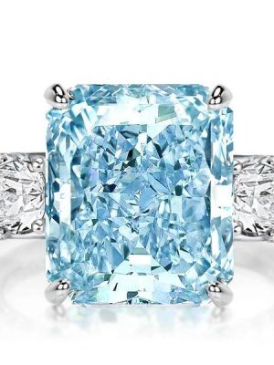 Three Stone Radiant Cut Aquamarine Engagement Ring in Rhodium Plated Sterling Silver