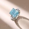 Three Stone Radiant Cut Aquamarine Engagement Ring in Rhodium Plated Sterling Silver