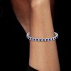 Princess Cut Blue Sapphire Tennis Bracelet in Rhodium Plated Sterling Silver