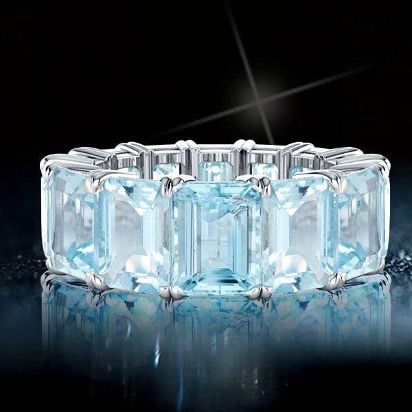 Emerald Cut Aquamarine Eternity Wedding Band in Rhodium-Plated 925 Sterling Silver