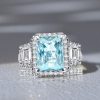 3.50 CT Aquamarine Radiant Cut Halo Engagement Ring Set in Rhodium-Plated Sterling Silver