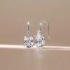 Classic 4 Prong Oval and Round Drop Earrings in Rhodium Plated Sterling Silver