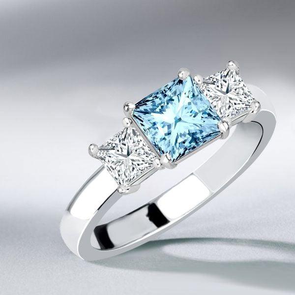 Princess Cut Aquamarine Three Stone Ring in Rhodium-Plated Sterling Silver