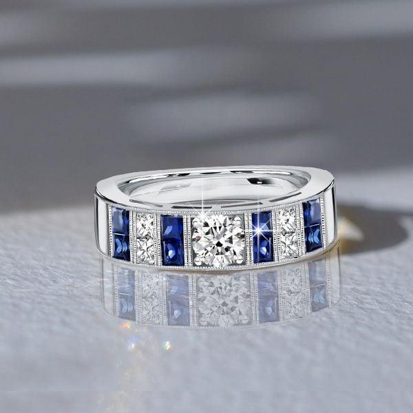 1.08 CT. TW. Princess Cut White & Blue Sapphire Wedding Band for Women in Sterling Silver