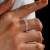 East West White Sapphire Baguette Cut Half Eternity Band in Rhodium Plated Sterling Silver