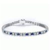 Round Cut Blue Sapphire Tennis Bracelet for Women in Rhodium Plated 925 Sterling Silver