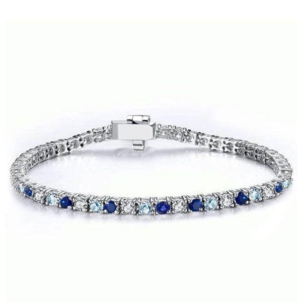 Round Cut Blue Sapphire Tennis Bracelet for Women in Rhodium Plated 925 Sterling Silver