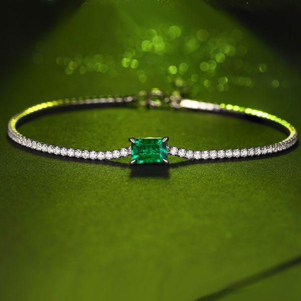 Emerald & Round Cut Tennis Bracelet in Rhodium-Plated 925 Sterling Silver