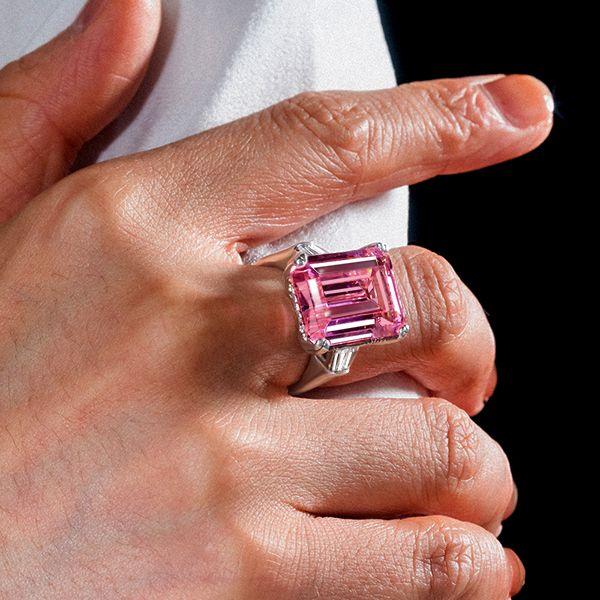 Three Stone Emerald Cut Pink Sapphire Engagement Ring in Rhodium Plated Sterling Silver