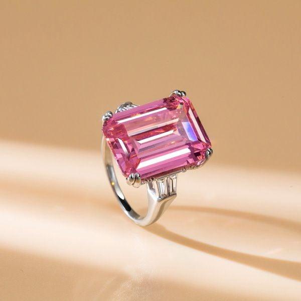 Three Stone Emerald Cut Pink Sapphire Engagement Ring in Rhodium Plated Sterling Silver