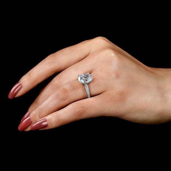 Oval Created White Sapphire Engagement Ring in Sterling Silver