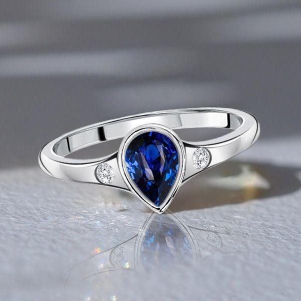 Pear Shaped Blue Sapphire 3 Stone Ring for Women in Sterling Silver
