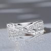 Channel Set Baguette and Round Cut Criss-Cross Diamond Wedding Band in Sterling Silver