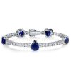 Blue and White Multi-Cut Sapphire Tennis Bracelet in Rhodium-Plated Sterling Silver