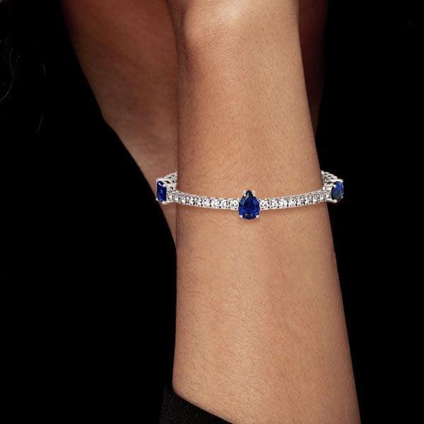 Blue and White Multi-Cut Sapphire Tennis Bracelet in Rhodium-Plated Sterling Silver