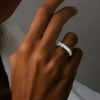 Created White Sapphire Cushion Cut Eternity Wedding Band in Rhodium-Plated Sterling Silver