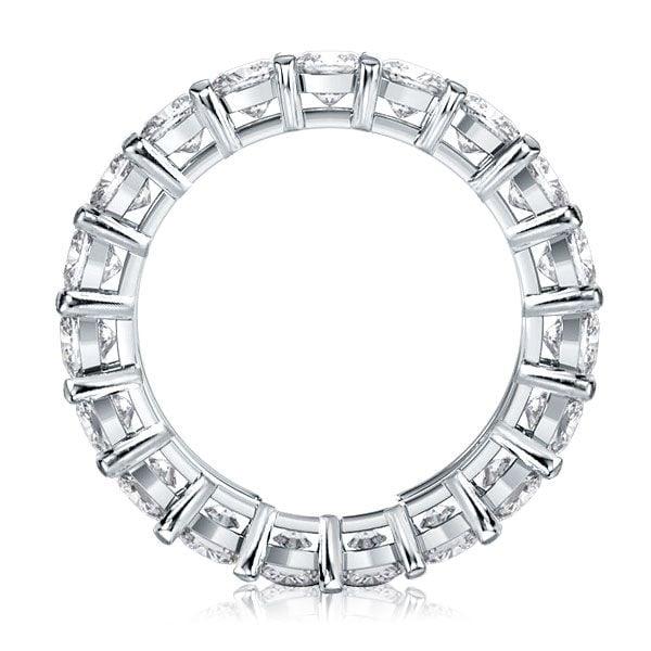 Created White Sapphire Cushion Cut Eternity Wedding Band in Rhodium-Plated Sterling Silver